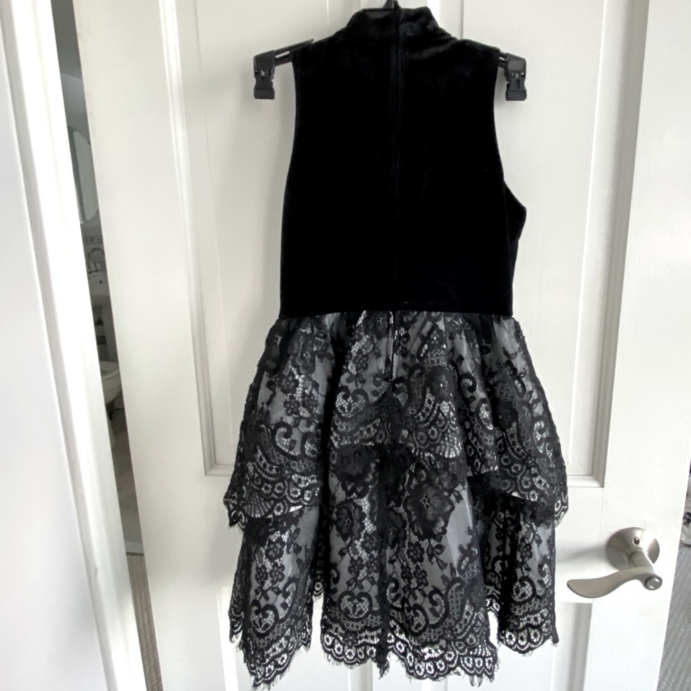 Girls sz10 black holiday dress. Key hole neck
